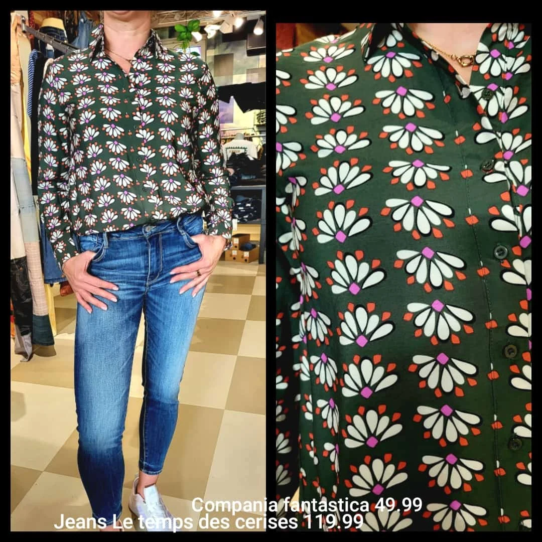 Grüne Bluse mit buntem Muster und blauer Jeans im Crash Store.